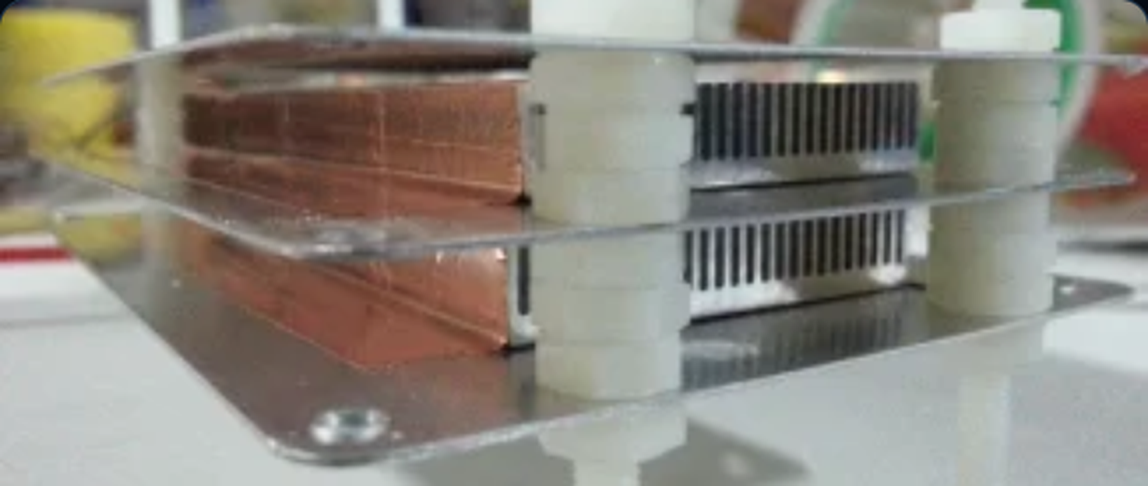 T-Blade thruster assembly with copper plates and white supports
